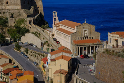 High angle view of street amidst buildings in city