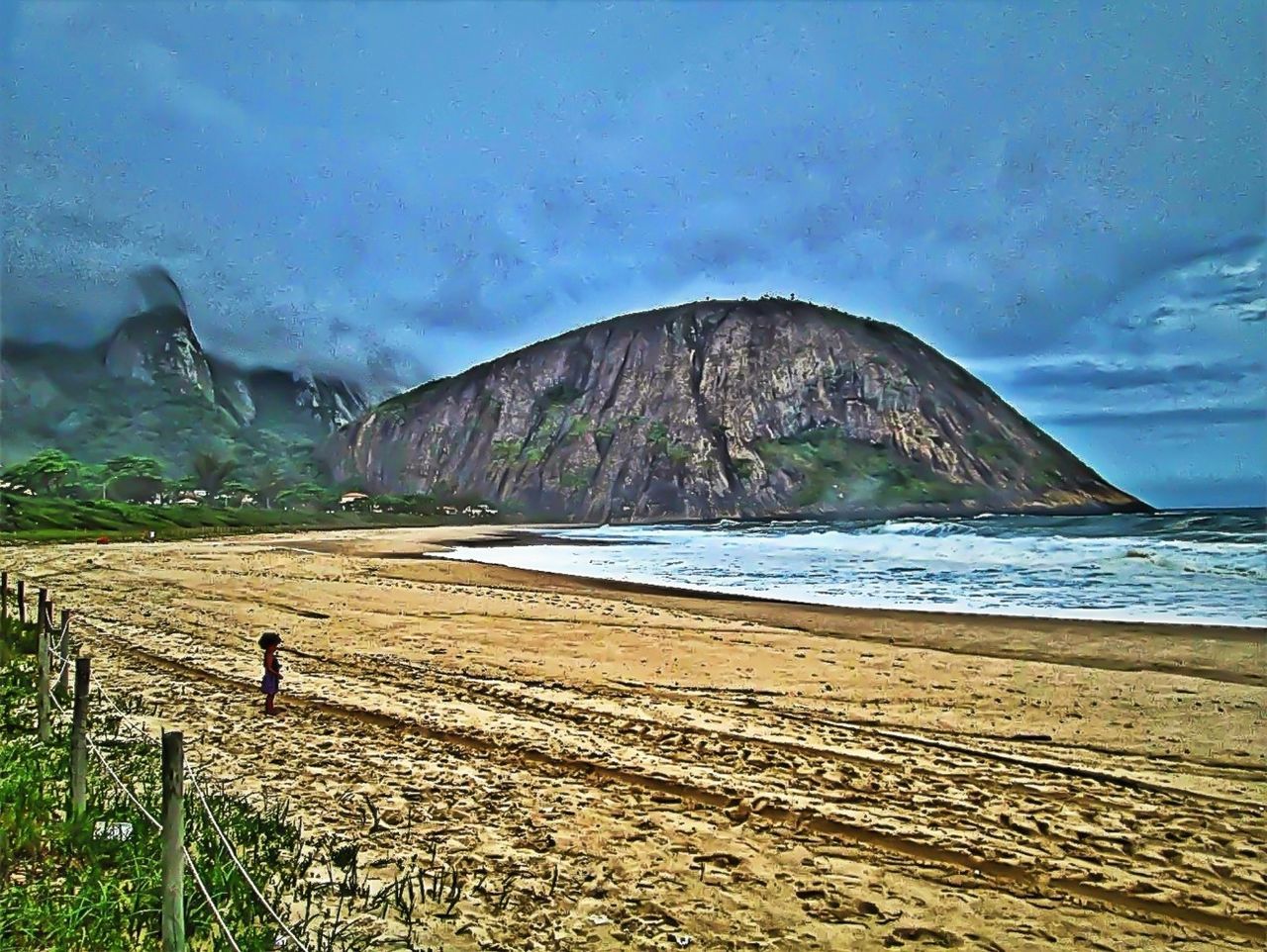 mountain, water, beach, tranquil scene, scenics, sea, tranquility, beauty in nature, sand, sky, nature, shore, mountain range, blue, coastline, idyllic, non-urban scene, day, remote, incidental people