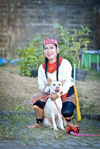 Portrait of woman with dog