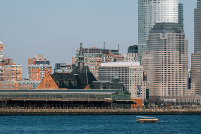 Central railroad of new jersey terminal with modern architecture of lower manhattan