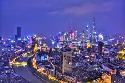 Illuminated cityscape at night