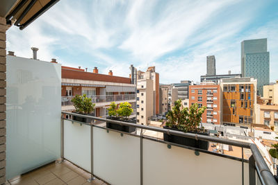 Buildings in city against sky