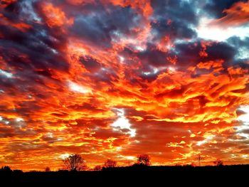 Low angle view of dramatic sky during sunset