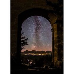 Built structure against sky at night