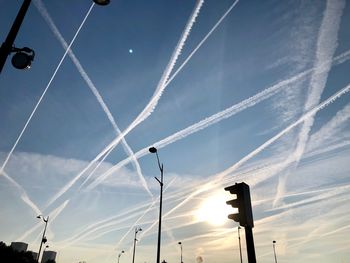 Low angle view of vapor trails in sky
