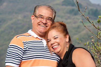 Portrait of young man against plants