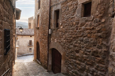 Narrow alley amidst buildings