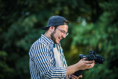 Midsection of man photographing