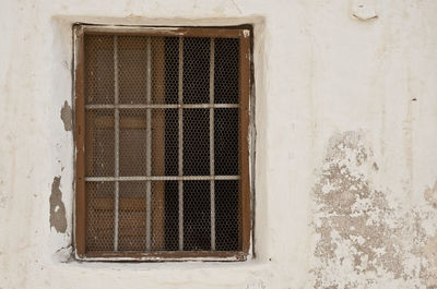 Low angle view of window on old building