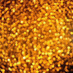 Defocused image of illuminated yellow lights
