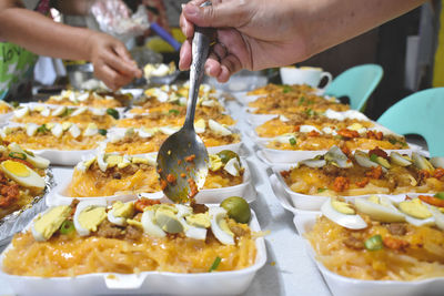 Close-up of hand eating food