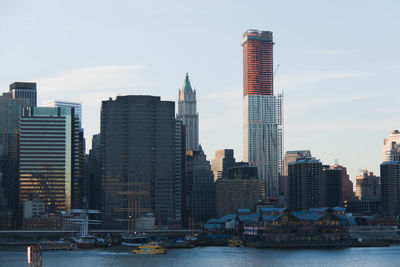 Modern buildings in city against sky