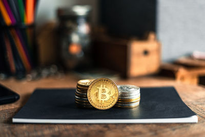 Close-up of coins on table