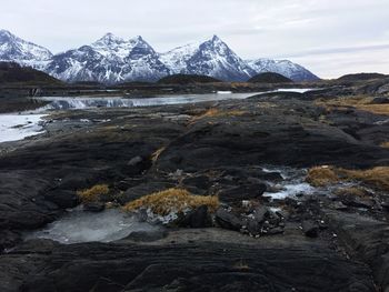 Scenic view of landscape and mountains against sky