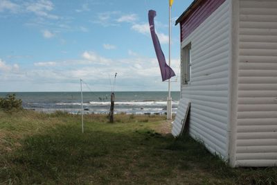 Scenic view of beach against sky