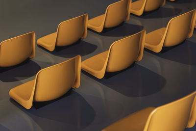 High angle view of yellow chairs