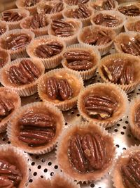 Full frame shot of pecan pies on metal