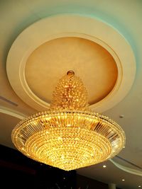 Low angle view of illuminated chandelier