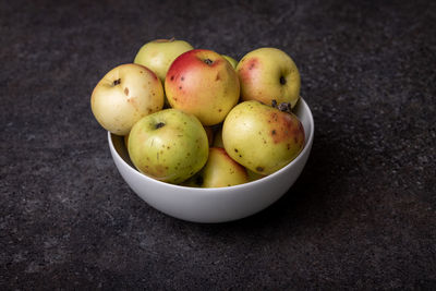 High angle view of fruits in bowl on table