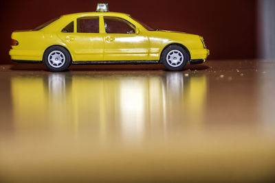 Yellow toy car