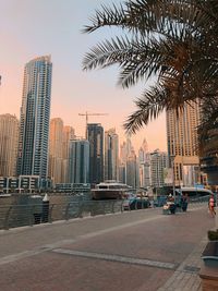 Modern buildings in city against sky
