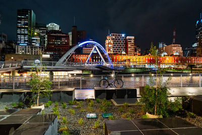 Illuminated buildings in city at night