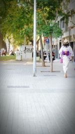 Man walking on road