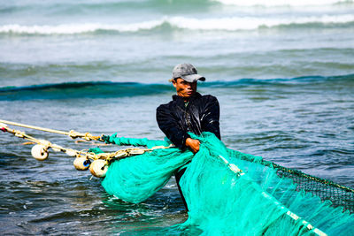 Young man in sea