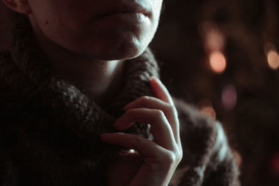 Close-up of woman hand holding cigarette