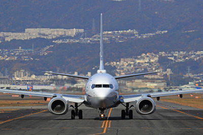 Airplane at airport runway