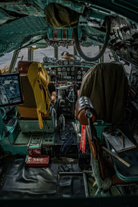 Rear view of worker working on table