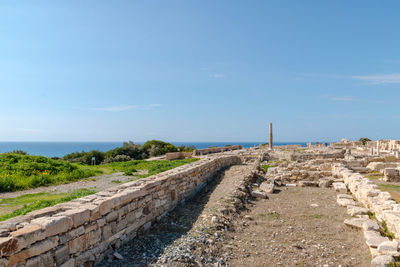 Scenic view of sea against blue sky