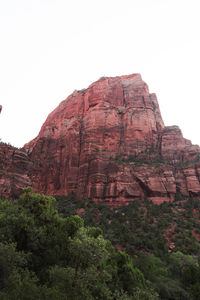 Rock formation on mountain against sky