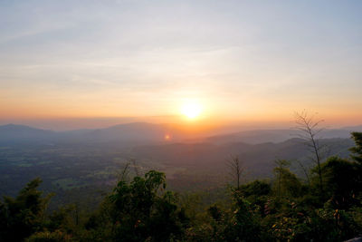 Scenic view of mountains against sky during sunset