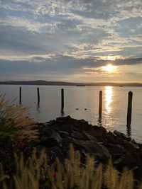 Scenic view of sea against sky during sunset