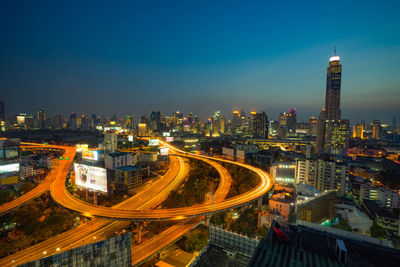 High angle view of illuminated city at night