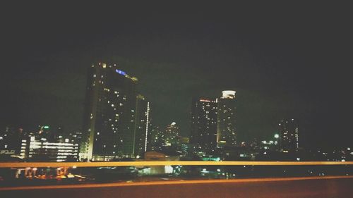 Illuminated cityscape at night