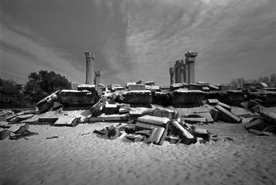 Garbage on construction site against sky