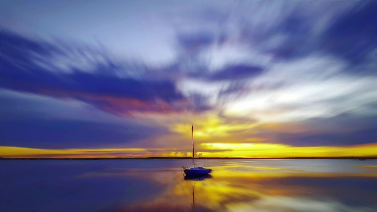 SCENIC VIEW OF SEASCAPE AGAINST SKY