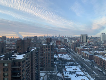 High angle view of buildings in city during winter