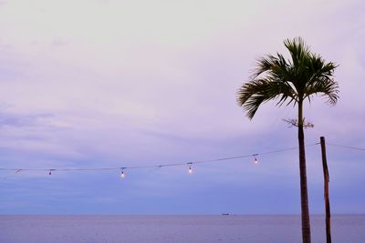 Scenic view of sea against sky at dusk