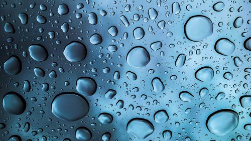 Close-up of water drops on glass