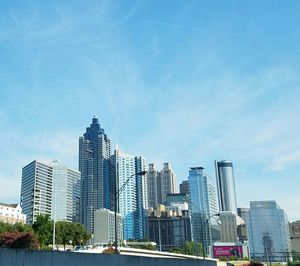 City skyline against blue sky