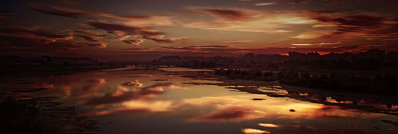 View of calm sea at sunset