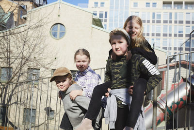 Portrait of children outdoors