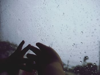 Close-up of raindrops on glass window