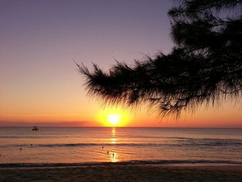 Scenic view of sea at sunset