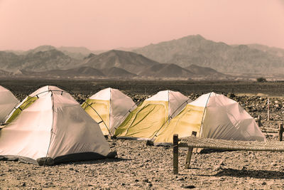 Tent on beach against sky