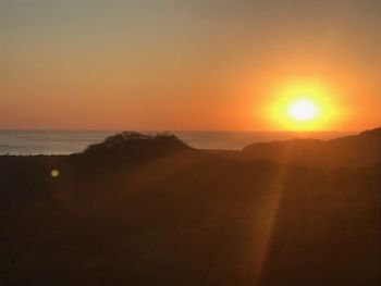 Scenic view of sunset over sea