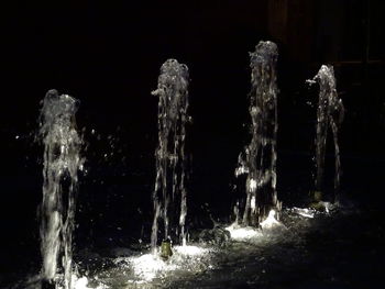 Close-up of icicles at night